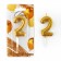 A candle for a cake, a number, shiny "2", gold, 4 x 10 cm.