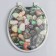 The toilet seat with a lid, Rossplast, 43 × 37 cm, soft, gray color, Mix drawing