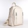 Women's backpack made of artificial leather with zipper, 6 outer pockets, milk color