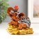 Polystone souvenir "Elephant with ruby ​​on coins" 8x6.5x8.5 cm