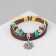 Bracelet Leather "Flower" with beads, 3 threads, colored, d = 5 cm