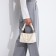 Baget bag with zipper, dairy color
