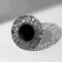 Ring of the "ethnic" openwork circle, black color in black silver, dimensionless
