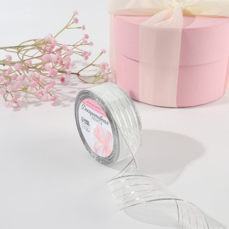The ribbon is nylon, with lurex, 25 mm × 9.1 ± 0.5 m, white/silver color