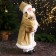 Santa Claus "in a cap, a gift and berries" 46 cm, gold