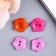 A set of buttons of decorative plastic "flowers" 1.2x1.2 cm, mix