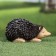 Garden figure "Hedgehog is heating" 18x10x10cm ////