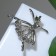 Brooch "Ballerina" with beads, white color in silver