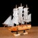 The ship souvenir medium "Ginder", board is light wood, white sails, 30x7x30 cm