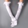 Carnival accessories with feathers, white color