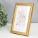 Photo frame plastic "Mira" 10x15 cm gold (plastic screen)