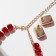 Set 4 objects: earrings, necklaces, bracelet, “evening” ring volume, red in gold