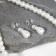 Set 2 objects: earrings, Antoinette necklace and a number of beads, white color in silver, 40 cm