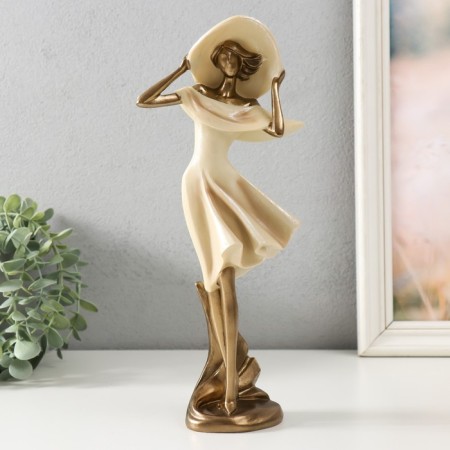 Polystone souvenir "Girl in a wide -brimmed hat. Wind" Sand with bronze 12.5x9.5x31 cm
