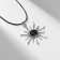 Piece on the lace "Sun", black color in black silver on a black lace, 45 cm
