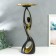 Souvenir Polystone stand "Abstraction. Bends" black with gold d = 30 cm 70x23x21 cm
