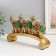 Polystone souvenir "Three elephants on the arc - Popon with red -green" 24x5x15 cm