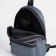 A backpack with a zipper, "saxi", outer pocket, dark gray color