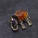 Brooch "Elephant", brass, amber