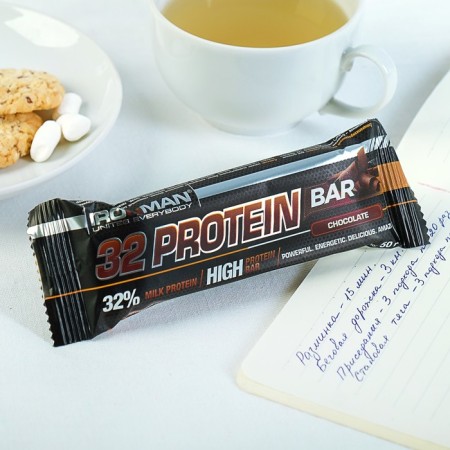 Batonchik "32 Protein". 50 g chocolate/dark glaze