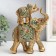 Polystone souvenir "Elephant with an elephant on the back - exotic flowers" 16x6.5x20.5 cm