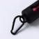 A container with a flashlight, cleaning packages for dogs (roll 15 pcs), black