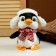 Soft toy "Penguin" in a hat, 22 cm, black color