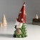 Suvenir Polystone "Santa Claus in a cap with snowflakes, with a bag and a snowman" 10x8x23 cm