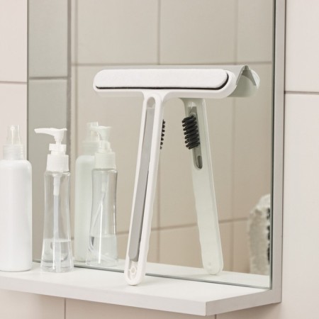 The Raccoon "compact" tweezer, abrasive detergent, additional brush in the handle, TPR.