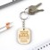 A wooden key key, a “beloved husband” token 3.5 x 4.5 cm