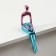 Polystone souvenir "Man with a ball" pink-blue 5.6x9x23 cm