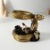 Polystone souvenir "Snake with skulls and black roses" 11.5x16x13 cm