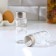 Glass set for spices on a stand, 4 items: a solo, a lists, a napkin, a capacity for toothpicks