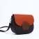 Richet bag on a magnet, a long belt, an orange/brown color