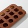 Form for chocolate of the share “circles, squares”, silicone, 21.5 × 10.4 × 1.5 cm, 15 cells, brown color