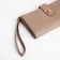 Women's wallet on the button, beige color