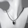 Kulons "Uzolnutini" on the magnet, halves of the heart, black-silver color, 48 cm