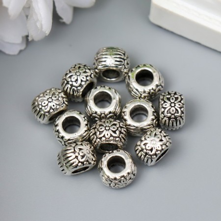 Busina for creativity Metal "Patterned bow" silver G203B1012 1x0.7 cm