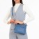 Bag Cross-Bodi with a zipper, blue color