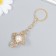 Breek Metal "Cross" Pearl, gold 5x4 cm