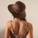 Women's hat with a minku chain color brown, size 56-58