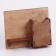 The keywood is wall -mounted with the pocket shelf.