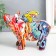 Souvenir Polystone "Pig with Wings" graffiti mix 8.5x18x13 cm