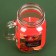 New Year's candle in a jar with a handle of "spice", cinnamon