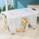 The storage container on the wheels "Bear and kitten", 50 l, 60 × 38 × 31 cm, the color is transparent
