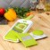 Vegetable engine - Shinkovka with interchangeable nozzles and a shares container, 6 nozzles, 14 × 12.5 × 38.1 cm, white, green color