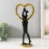 Souvenir Polystone "Abstraction. Kiss at the heart" gold with black 14.5x9x32 cm