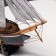 The ship souvenir medium "Fugas", sides dark with a white strip, 45x50x9 cm, mix