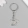 Metal keychain "Pesik with chamomile" 1.9x2.5 cm
