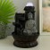 The desktop fountain from the network, backlight "Buddha in gray against the wall" 20x20x30 cm